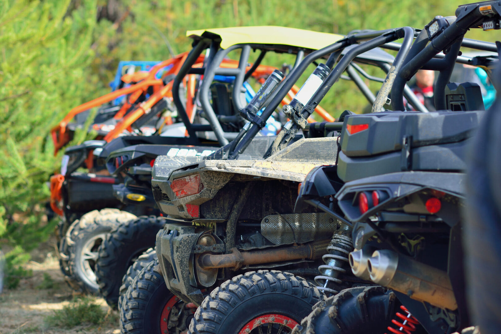 Off-road vehicles parked in a row
