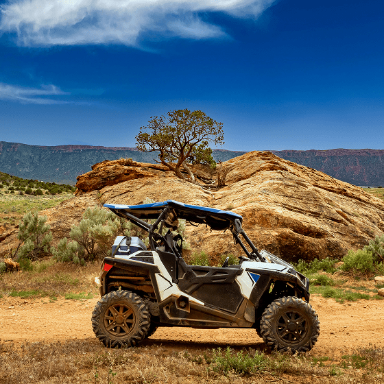 Off-road vehicle on desert trail